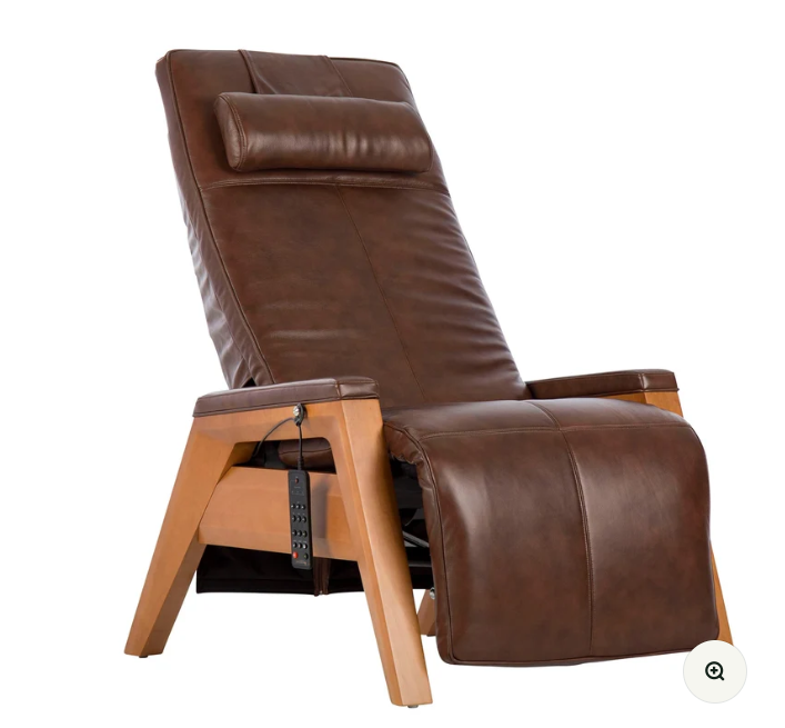 Brown leather Human Touch Gravis lounge recliner with wood arms and footrest